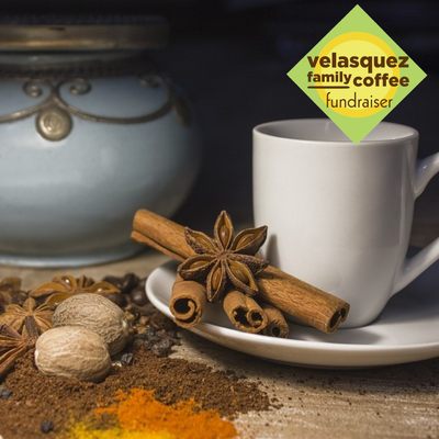 Images shows Coffee cup, cinnamon sticks and other spices. This flavor celebrates the fall flavors of nutmeg, cinnamon and spice