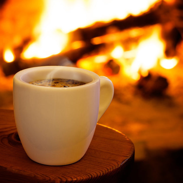 Steaming coffee mug in front of a warm fire, Drunken Uncle Coffee, Kahlua, Irish Cream and Gran Marnier